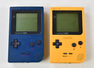 Lot 1170 - Two Gameboy pocket consoles, together with...