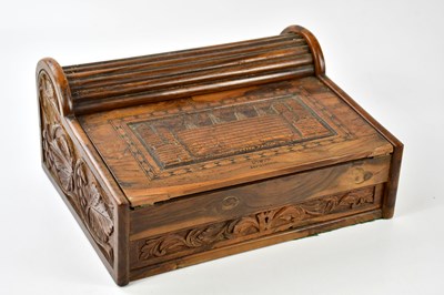 Lot 1070 - A carved walnut desk stand, with roll top...