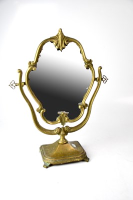 Lot 82 - An Edwardian-style brass swing mirror