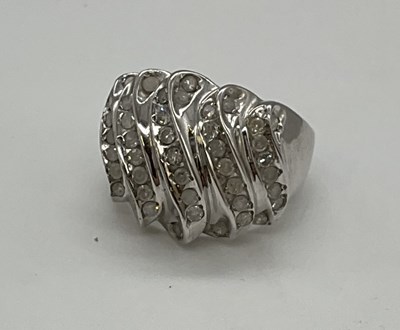 Lot 1216 - Two 9ct white gold dress rings, the larger...