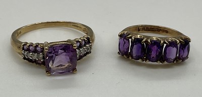 Lot 1234 - Two 9ct yellow gold dress rings, combined...