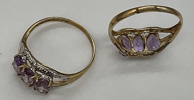 Lot 1251 - A pair of 9ct yellow gold dress rings,...