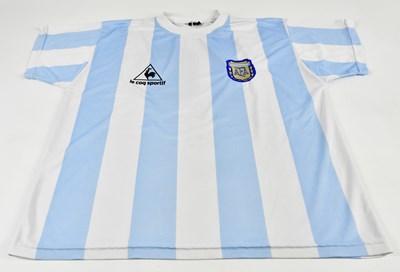 Lot 1277 - DIEGO MARADONA; a signed 1986 retro-style...