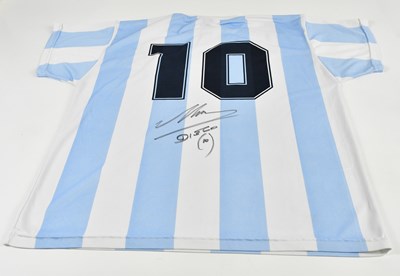 Lot 1277 - DIEGO MARADONA; a signed 1986 retro-style...