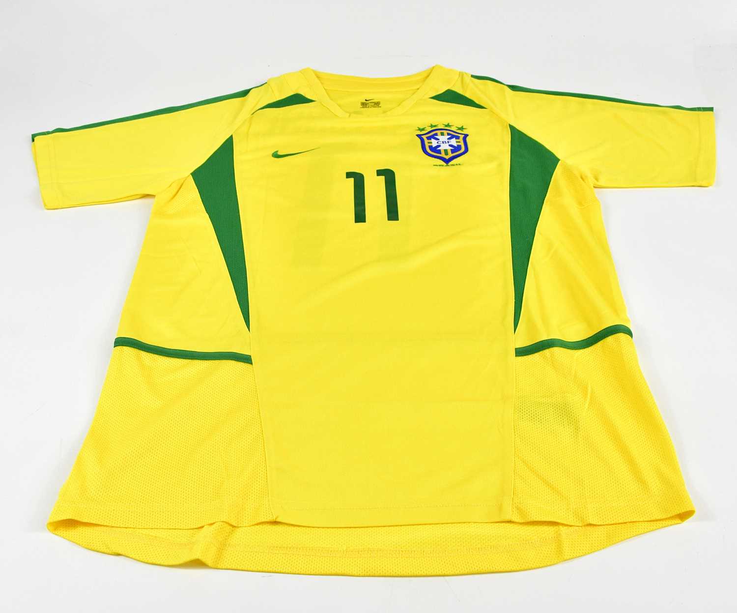 Lot 1270 - RONALDINHO; a signed 2002 Brazil retro-style...