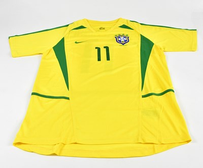 Lot 1270 - RONALDINHO; a signed 2002 Brazil retro-style...