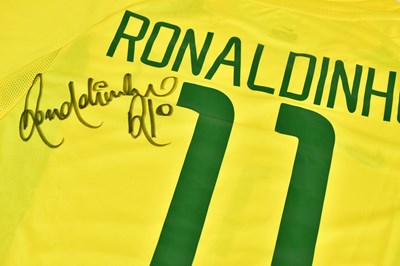 Lot 1270 - RONALDINHO; a signed 2002 Brazil retro-style...