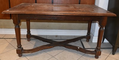 Lot 121 - A Continental walnut dining table with...