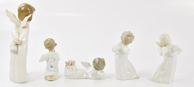 Lot 1412 - LLADRO; five Lladro figures of cherubs,...