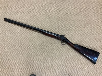 Lot 72 - A 19th Century flintlock rifle with mahogany...