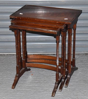 Lot 107 - A nest of three reproduction mahogany...