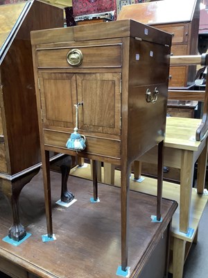Lot 2368 - A George III mahogany night cupboard with twin...