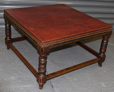 Lot 111 - A square coffee table with brass studded...