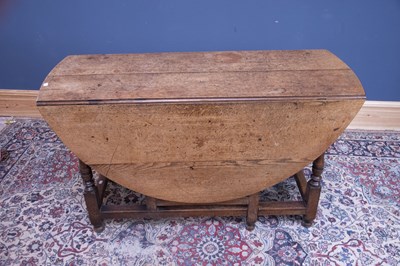 Lot 2544 - An 18th century oak drop-leaf gateleg dining...