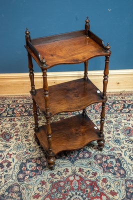Lot 2478 - A Victorian walnut three tiered whatnot of...