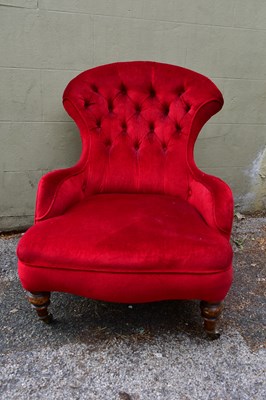 Lot 2479 - A late Victorian button upholstered low armchair.