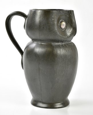 Lot 269 - TUDRIC; an Arts & Crafts jug modelled as an...