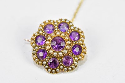 Lot 575 - A 14ct yellow gold amethyst and pearl flower...