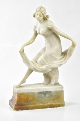 Lot 275 - A 1930s carved alabaster figure of a girl with...