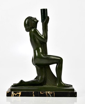 Lot 274 - A French Art Deco patinated spelter figural...