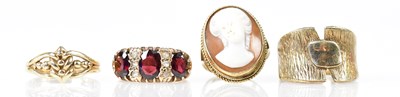 Lot 166 - A 9ct yellow gold garnet ring, an 8ct yellow...