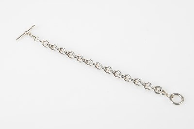 Lot 767 - A silver hoop link bracelet with simple T-bar...