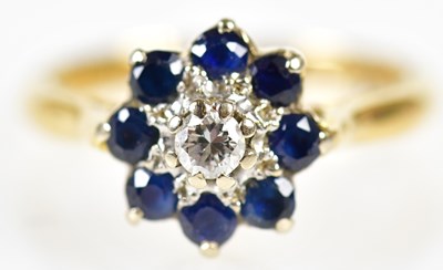 Lot 234 - An 18ct yellow gold sapphire and diamond...