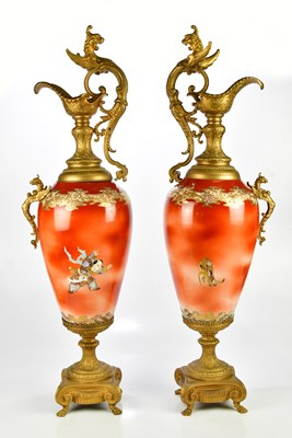 Lot 1157 - A pair of Japanese ewers with gilt metal...