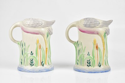 Lot 209 - CLARICE CLIFF; a pair of 'Flamingo' jugs,...