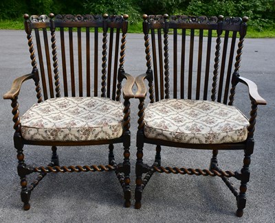 Lot 2490 - A pair of Carolean style carved oak hall...