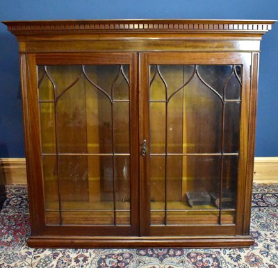 Lot 84 - An early 20th century mahogany bookcase with...