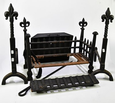 Lot 392 - A cast iron fireplace together with fire dogs...