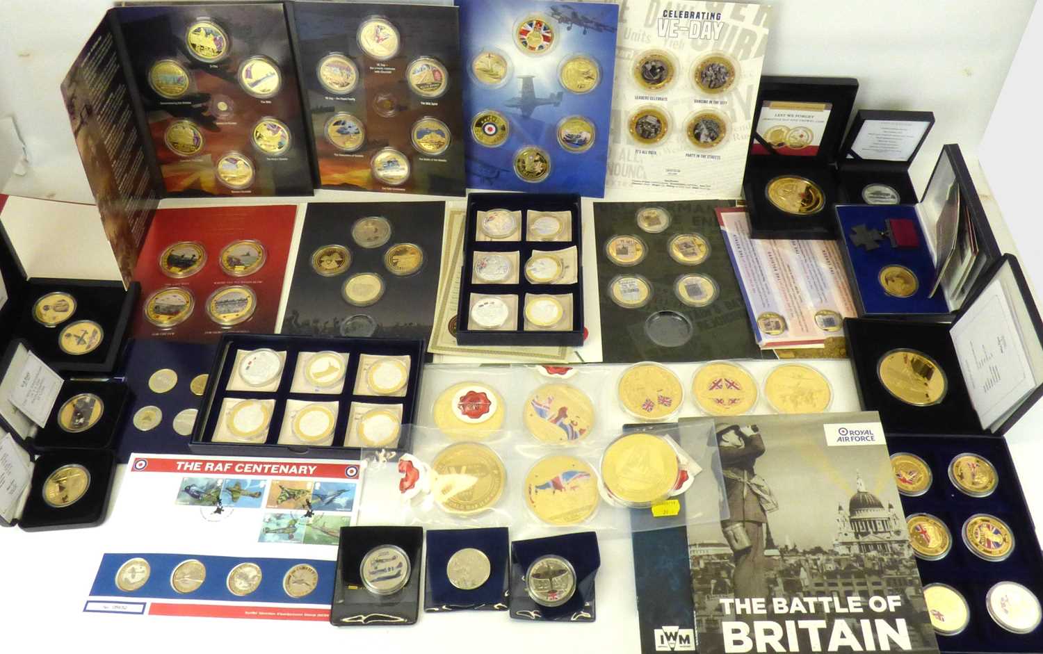 Lot 756 - A large collection of UK WWII commemorative coins and coin sets