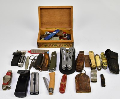 Lot 1074 - A collection of pen knives and multi tools, to...