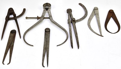 Lot 1072 - A group of seven outside calliper tools, one...