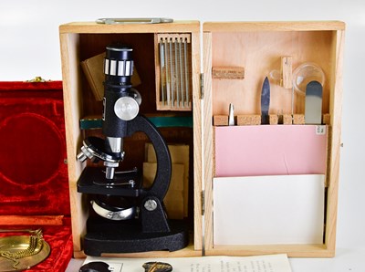 Lot 2238 - TOWA; a modern cased microscope, together with...