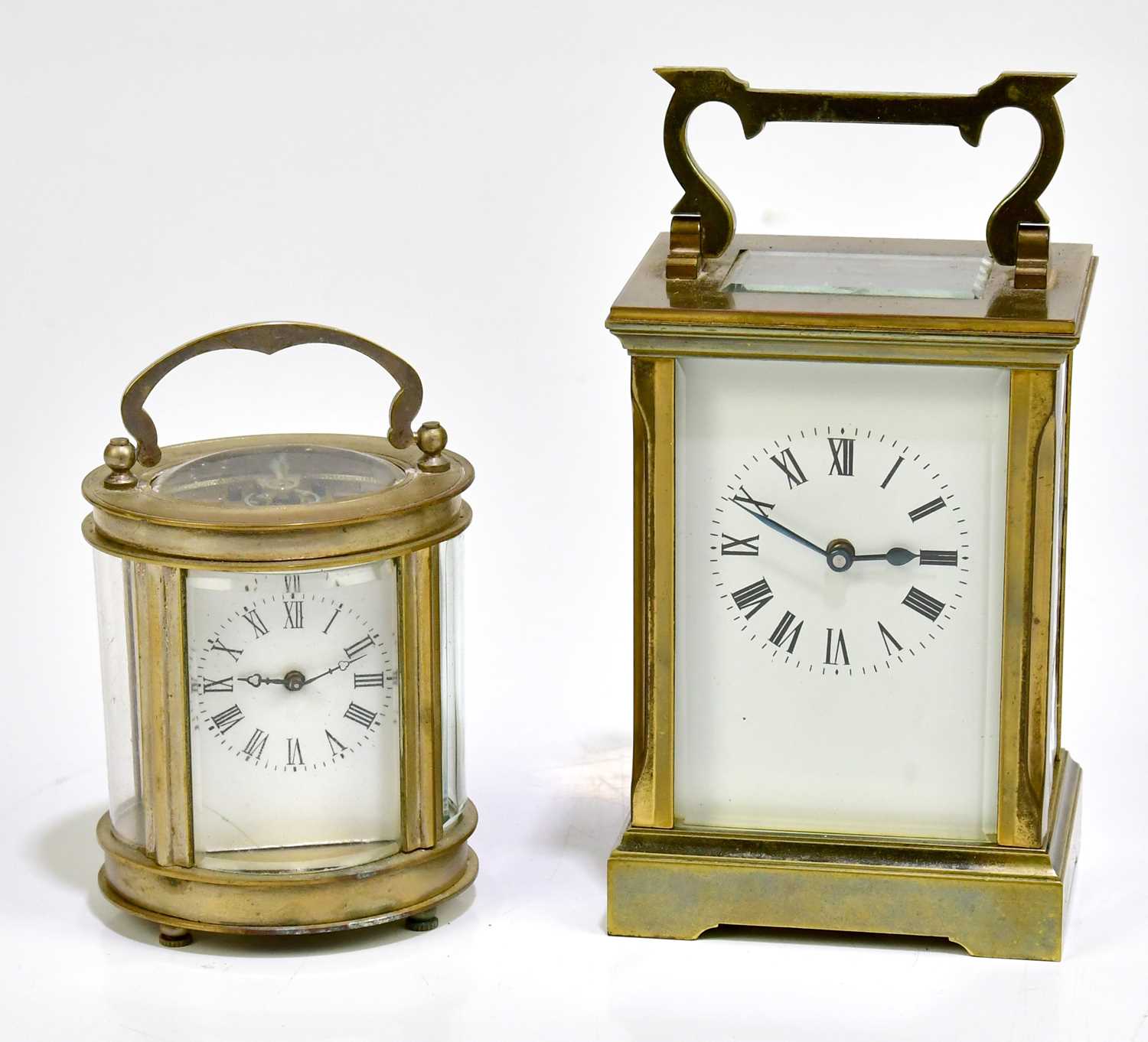 Lot 2257 - A brass cased carriage clock with white enamel...