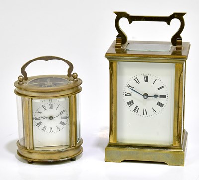 Lot 2257 - A brass cased carriage clock with white enamel...