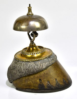 Lot 1082 - A horse hoof and brass bell, height 18cm.