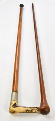 Lot 1083 - Two walking sticks, including a horn handled...