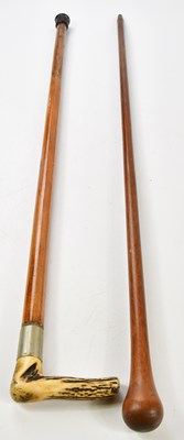 Lot 1083 - Two walking sticks, including a horn handled...