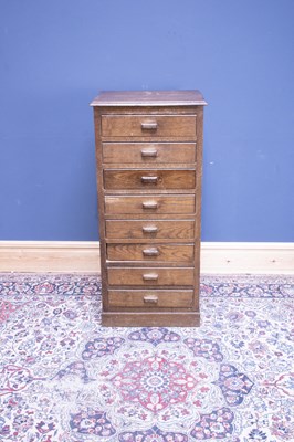 Lot 2417 - An oak eight drawer chest of narrow...