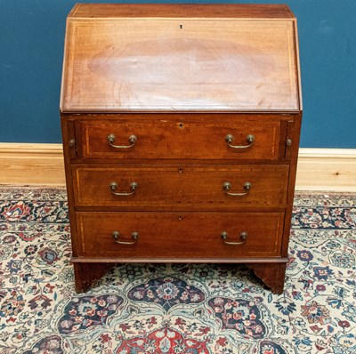 Lot 2418 - An Edwardian inlaid mahogany bureau, the fall...