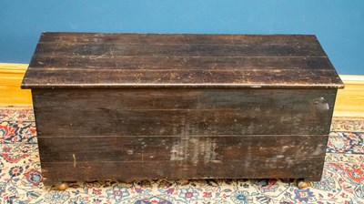 Lot 2554 - A stained pine blanket chest with tie-in...
