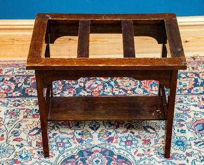Lot 2495 - An oak luggage stand, width 56cm, depth 38cm,...