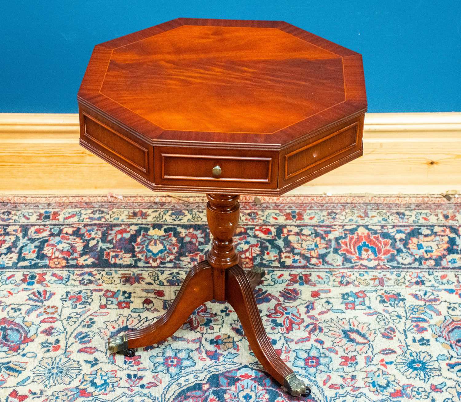 Lot 2609 - A reproduction octagonal table on tripod base.