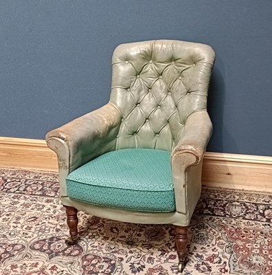 Lot 2367 - A 19th century leather button back tub chair,...