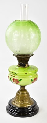 Lot 378 - An early 20th century oil lamp, the globular...