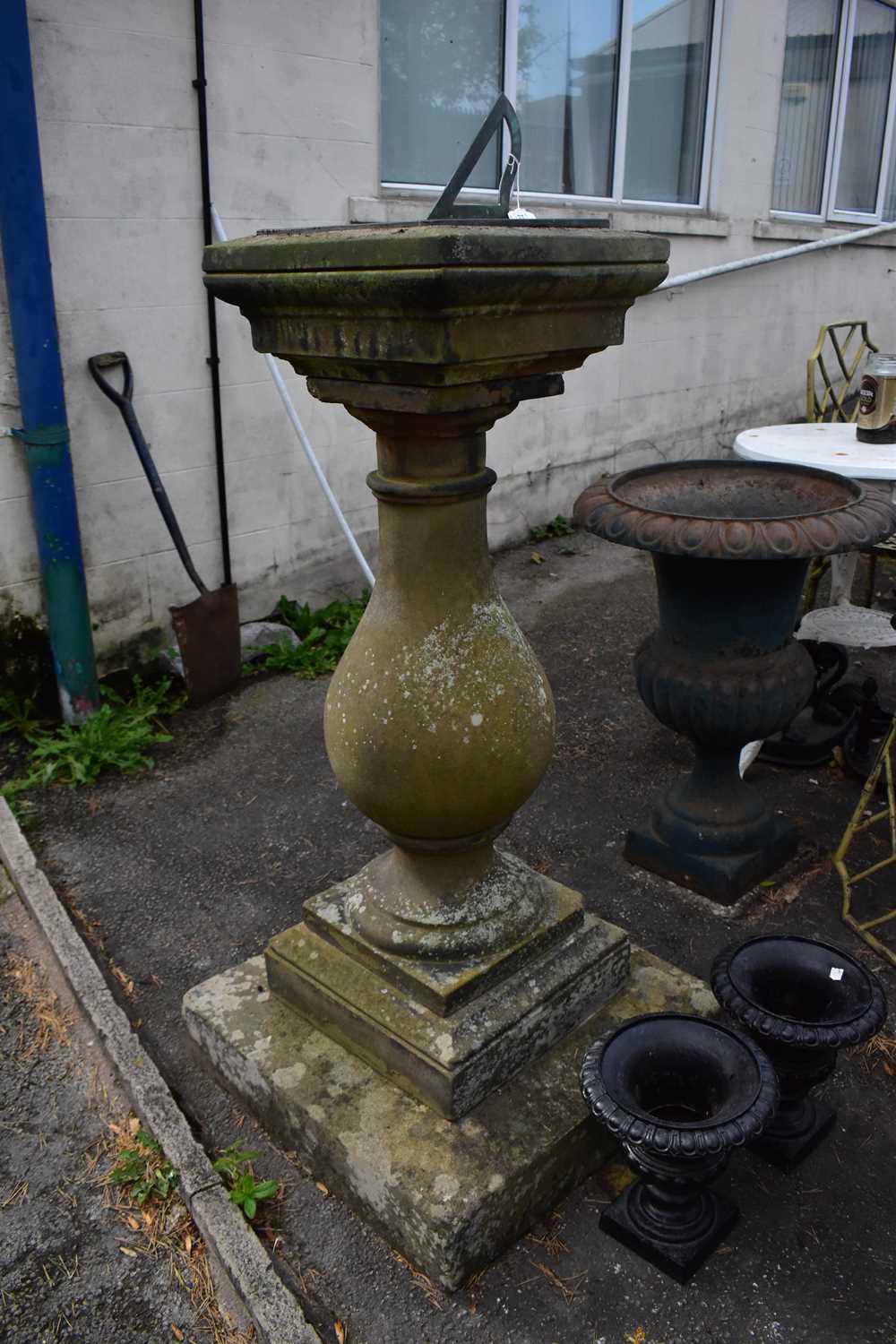 Lot 2295 - A slate sun-dial on stone pedestal,