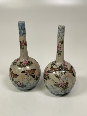 Lot 244 - A pair of Japanese porcelain vases, both with...